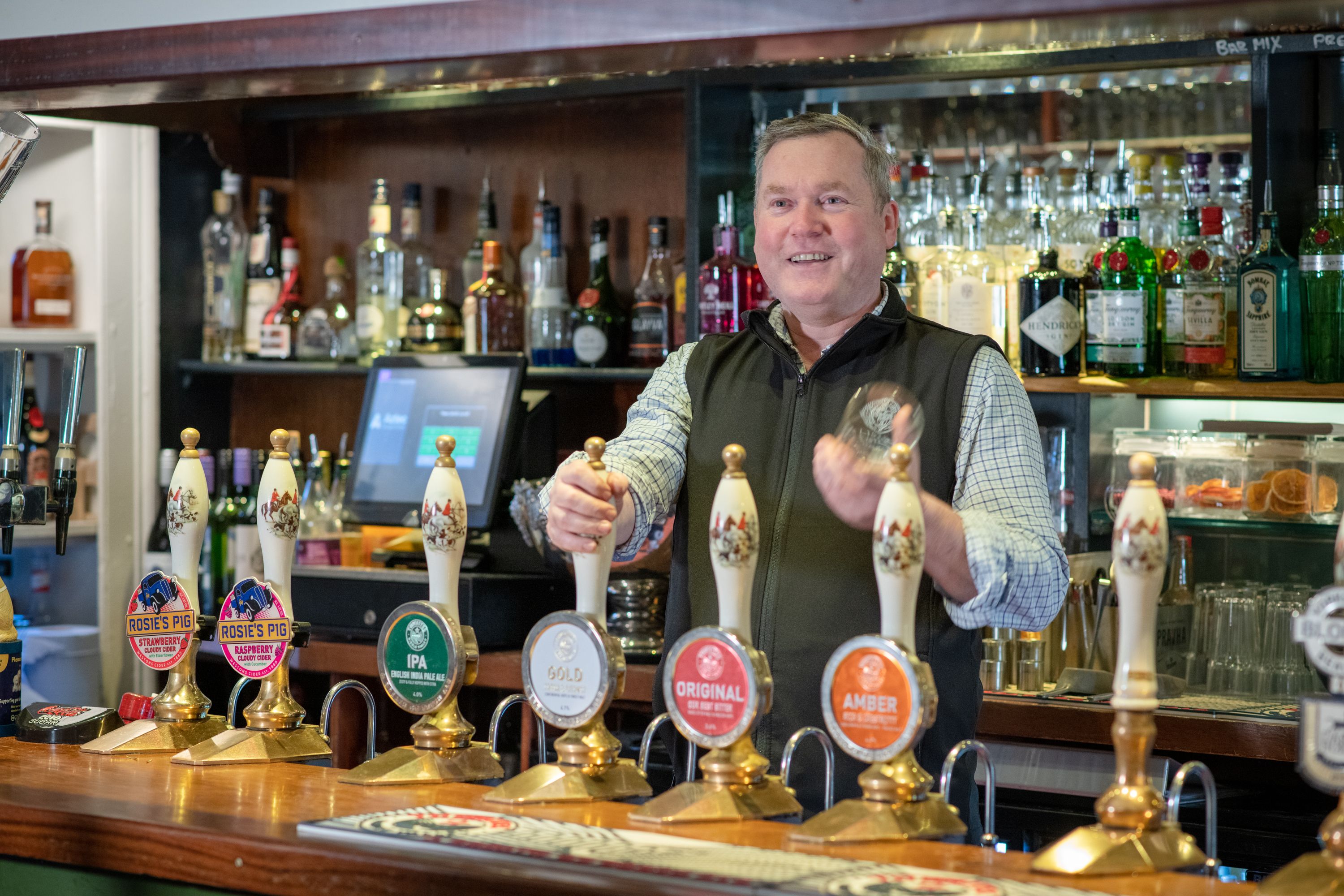 barman pulling pint