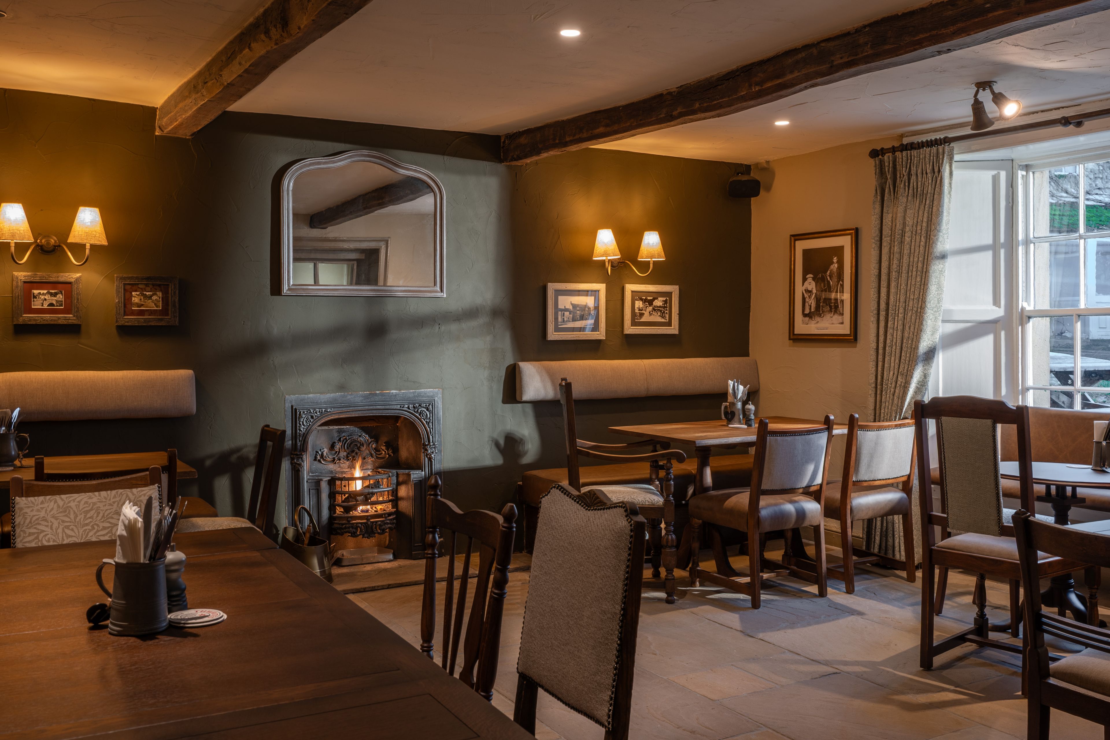 tables in the restaurant by the fire