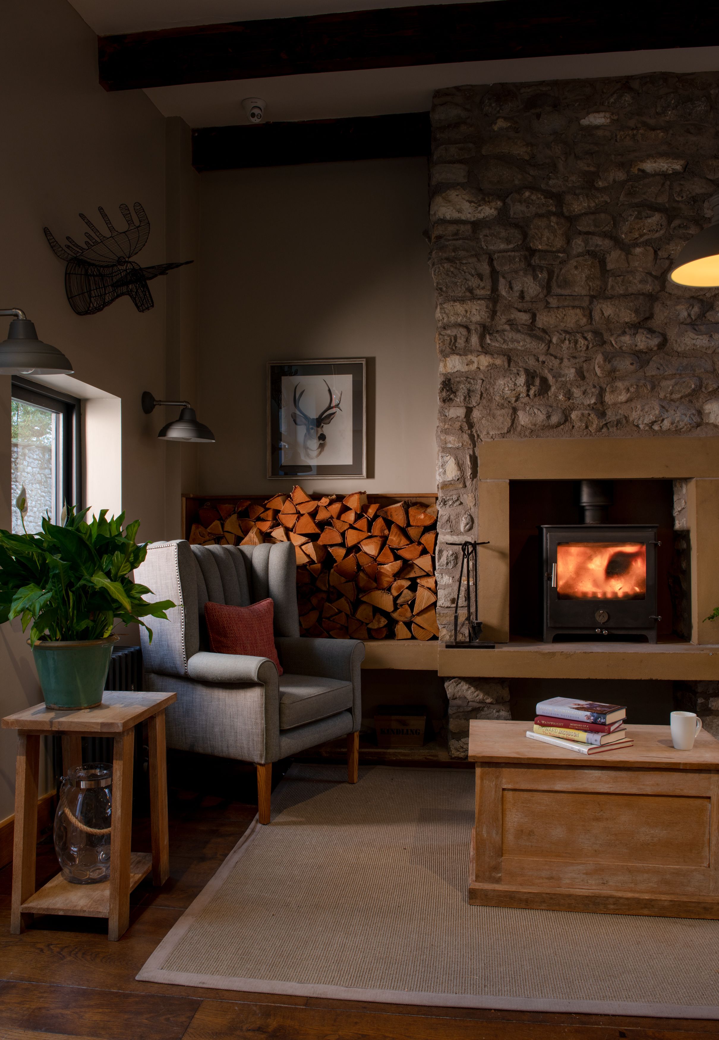 communal area at lister barn with a log burner